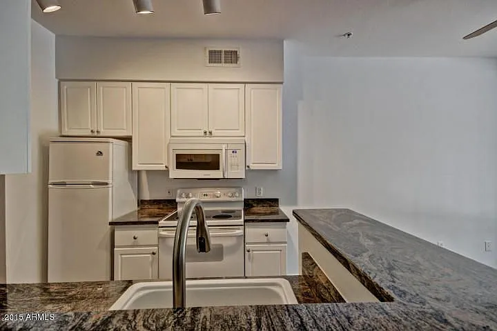 Building Photo - 1701 E Colter St #157