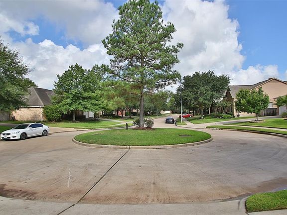 Quiet cul-de-sac with island also having sprinklers. Great for the kids to play out front or ride bikes.