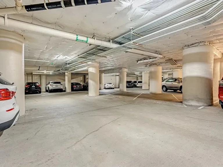 Covered and secured assigned parking spot included.