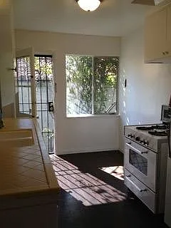 Newer stove not shown in pic. Stainless with fridge. Ceiling fan as well and custom switches in kitchen.