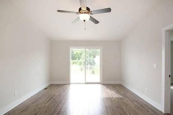 Spacious open floor plan with vaulted ceilings and high quality ceiling fan
