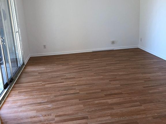 LIVING ROOM WITH BALCONY