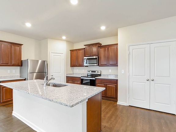 This move-in ready home features gorgeous granite countertops in the kitchen