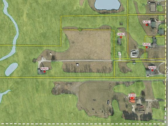 Home is nestled on 5 acres and has fenced pastures and wooded areas.