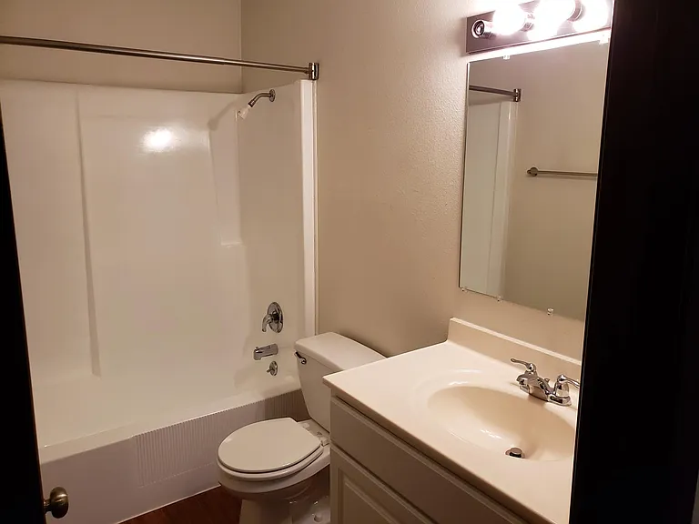 It's a full size bathroom and your water, hot & cold, is included in the rent :)