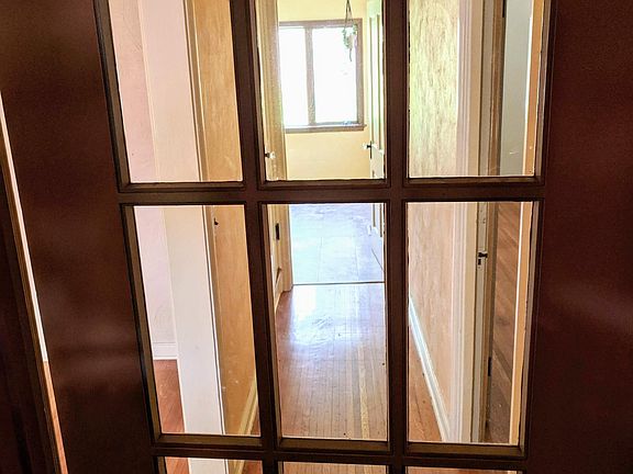 C'mon in... Front Foyer Entrance - Living room to the left, Kitchen straight ahead and the master bedroom and bath to the right.