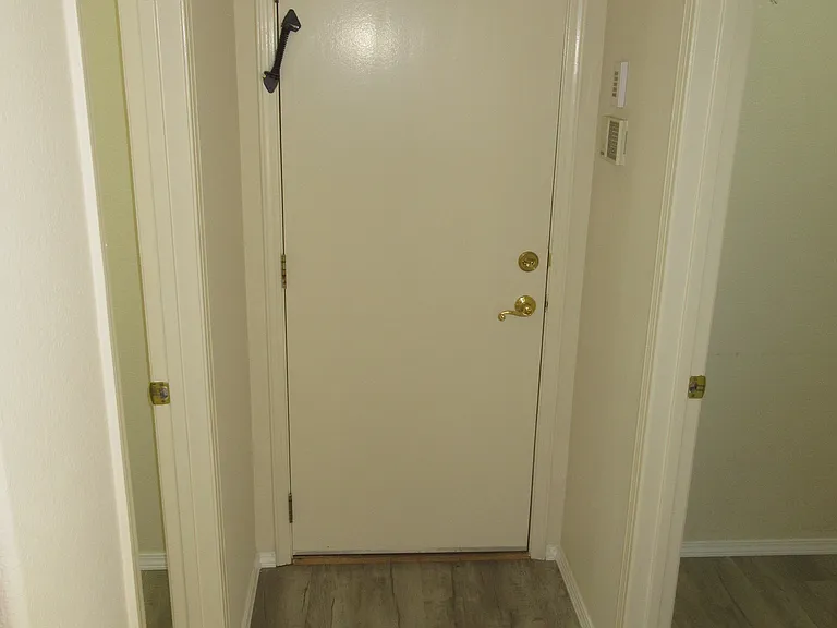 Powder Room/Garage Entry/Laundry Hallway