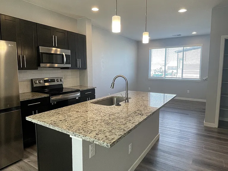 The Rowhomes at Greyhound Park — Photo 41