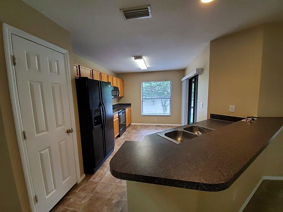 5th image of 2661 Oleander Lakes Dr