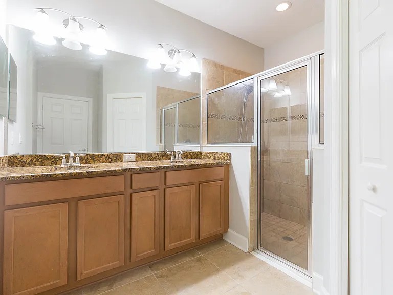 Primary bath- walk in shower and extra linen closet