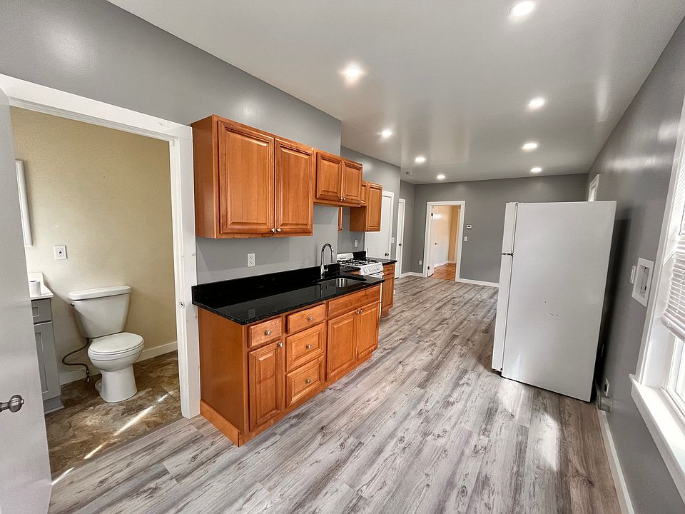 Laundry hookup right next to fridge.
