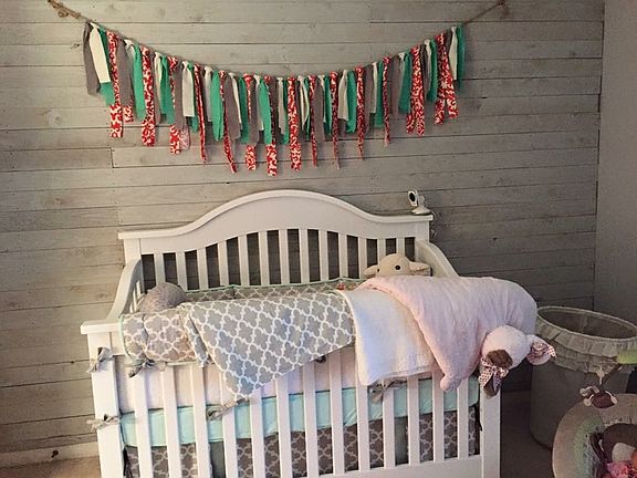 Guest room wood pallet wall 