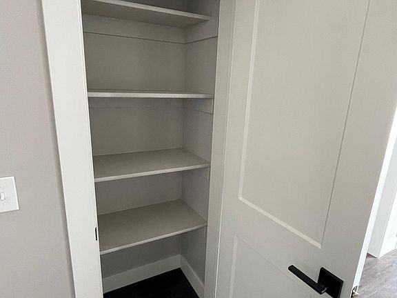 Small pantry closet in the kitchen for extra food storage