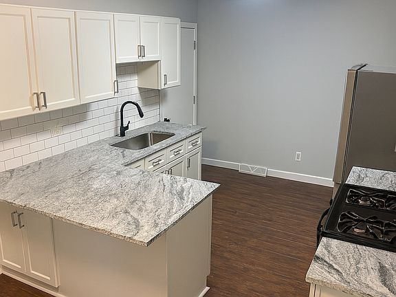 New cabinets, countertops, flooring