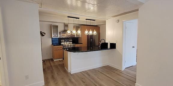 Open kitchen allows you share your time in the kitchen with your social and family time.