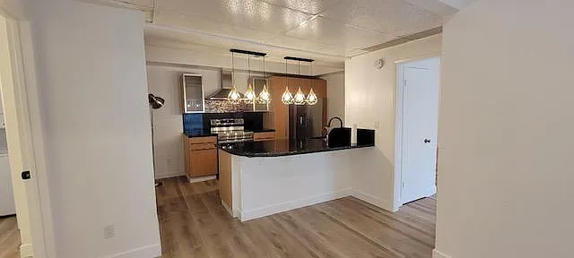 Open kitchen allows you share your time in the kitchen with your social and family time.