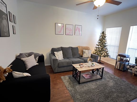 The roomy living room has two windows to bring the natural nights.