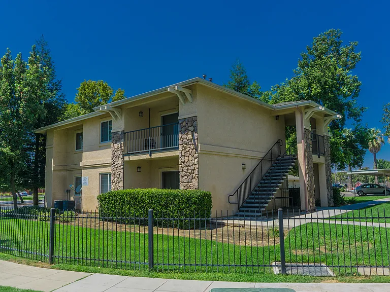 Peaceful community living surrounded by open green space and modern charm.