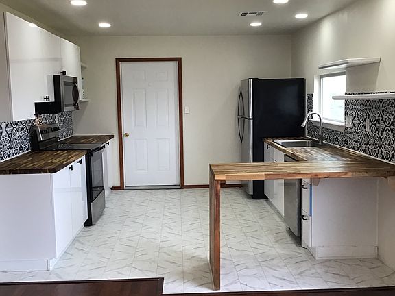 Kitchen leads to the mudroom