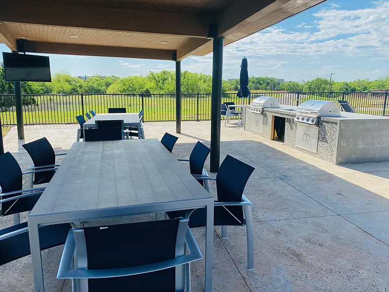 Outdoor grilling stations and covered TVs