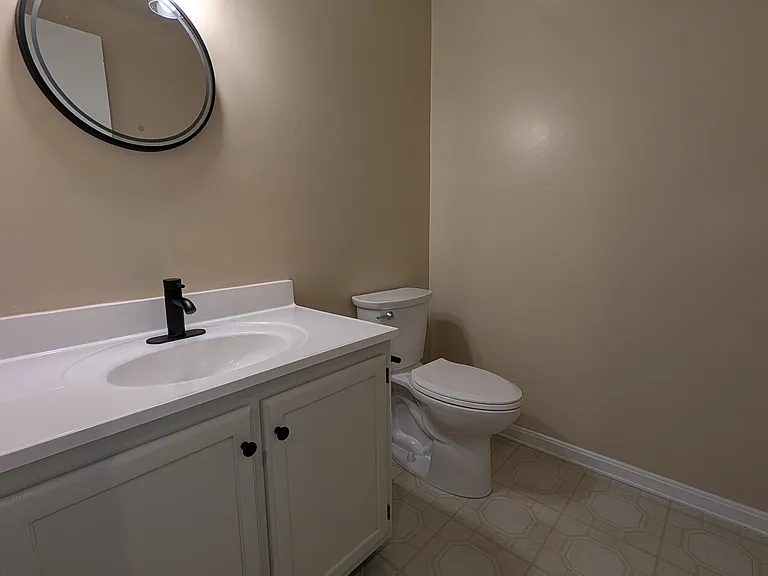 Basement half bath with new countertop