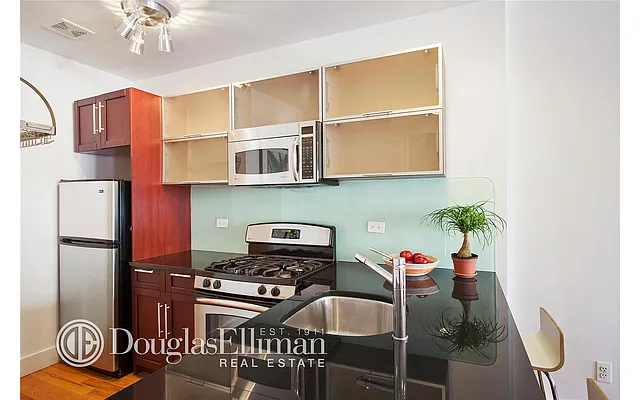 Sold by Douglas Elliman | media 27