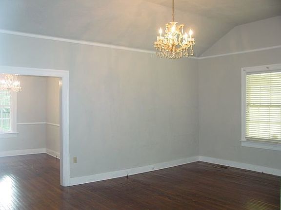 Living Room with soaring ceilings and chandelier