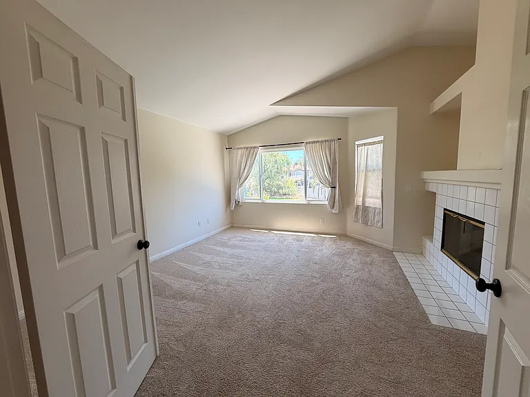 Primary bedroom with fireplace.