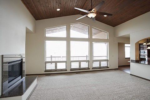 Great room w/fireplace & beautiful tongue in groove ceiling
