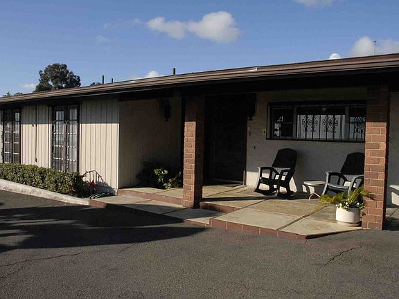 Partial view of front of house.