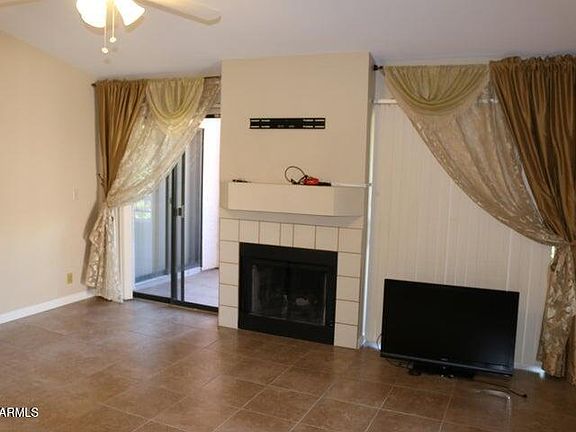 4th image of 9750 N 94th Pl Unit 208