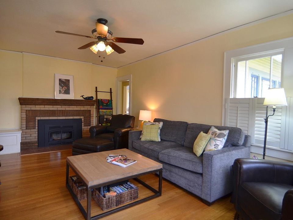 Living room with wood-burning insert.