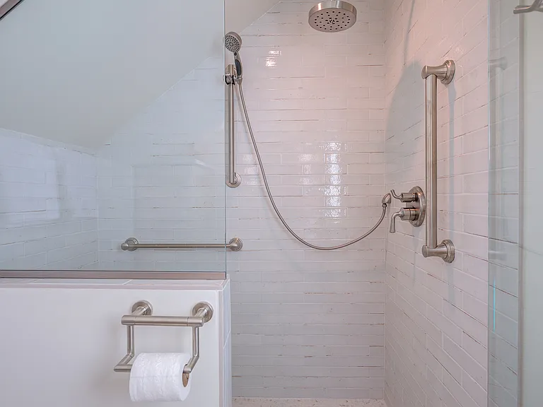 Upstairs bath walk-in shower.
