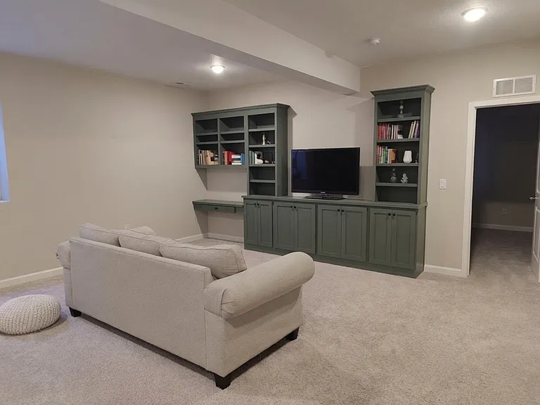 Basement, family room with custom built-in cabinets