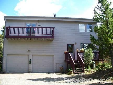 Front Of House
						:
						Two car garage, front porch and small balcony with a beatiful view of the divide