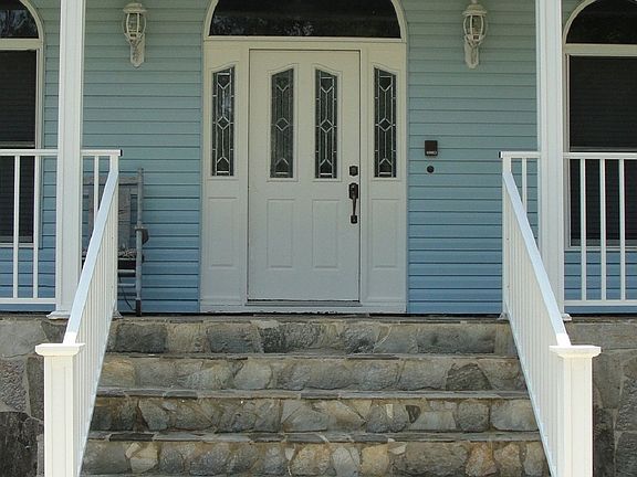 Main Entrance With Custom Stone Front Porch