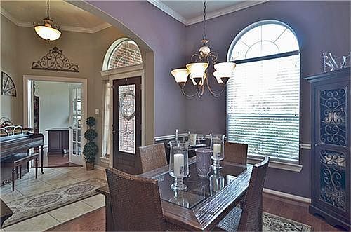 The dedicated study has beautiful hardwood floors and crown moulding.