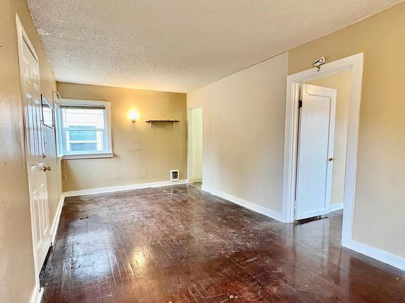 Floor was cleaned after this photo was taken but there is scratches on flooring from use