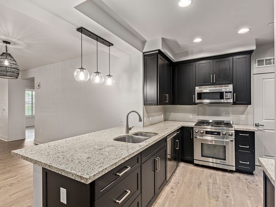 1st image of 4805 N Woodmere Fairway Unit 1005