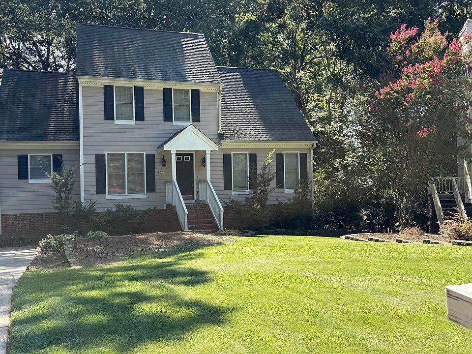 Home exterior and front yard.