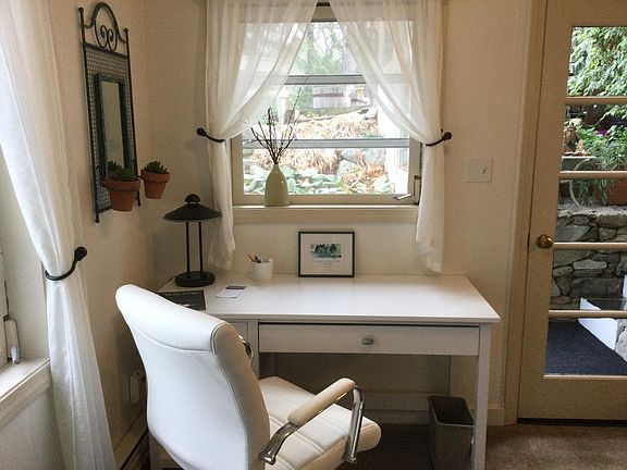 Work station with desk and chair.
