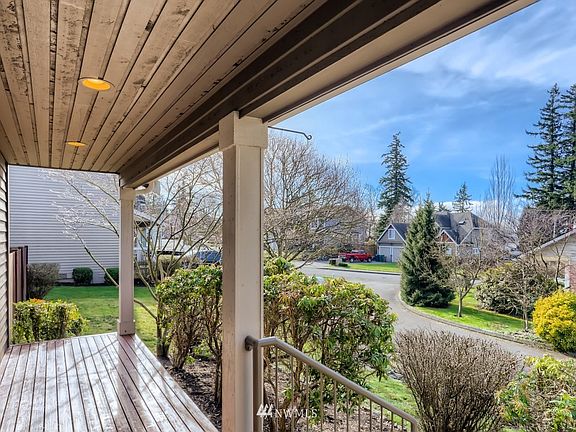 Covered front porch for sunsets, coffee and relaxing. 