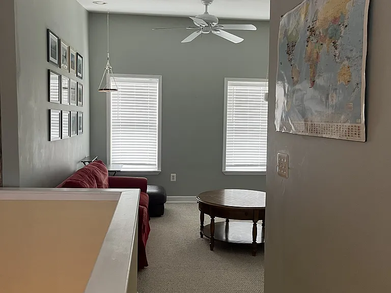 Third floor hallway to third bedroom, open area previously used as entertainment area