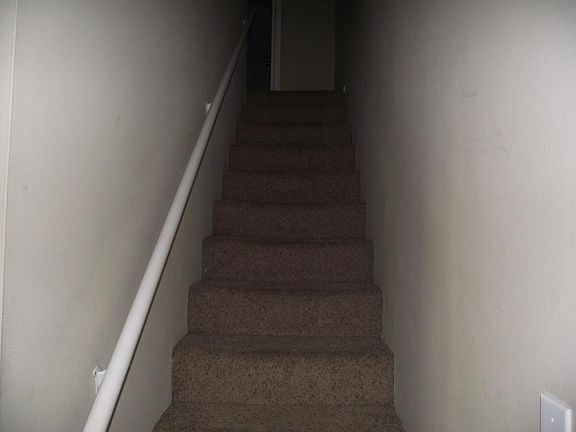 stairs to 2 bedrooms and remodeled bath