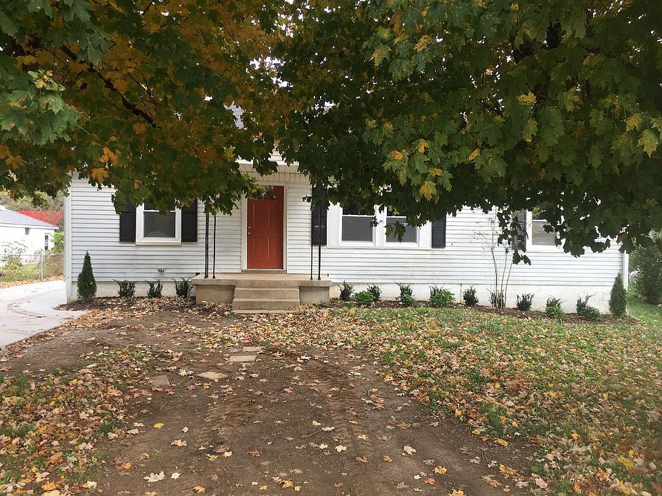 Front of 2105 Highland Avenue with beautiful shade trees.