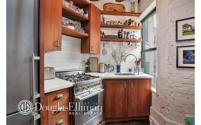 Sold by Douglas Elliman | media 10