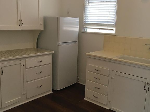 Kitchen with frig.