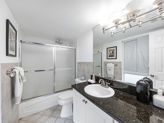 3rd image of 9971 W Bay Harbor Dr