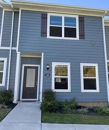 Beautiful townhome with sidewalks and green space