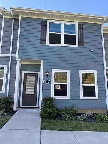 Beautiful townhome with sidewalks and green space